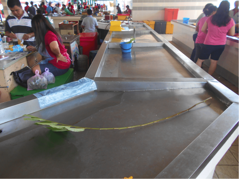 The Lundu wet market in south west Sarawak near the Kalimantan border. This is the best designed wet market I have ever seen with stainless steel, easy to clean tables for each trader. Taps supply clean water to every bay with good drainage from the table well down into an efficient underground drainage system. Brilliant.