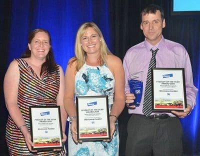 Tim and Tammy Stiller receive their Feedlot of the Year awards for yards less than 3000 head.