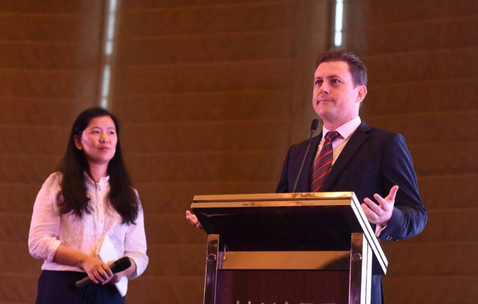Elder China's Craig Aldous, with interpreter, addresses last week's TSBE Access China conference in Shanghai