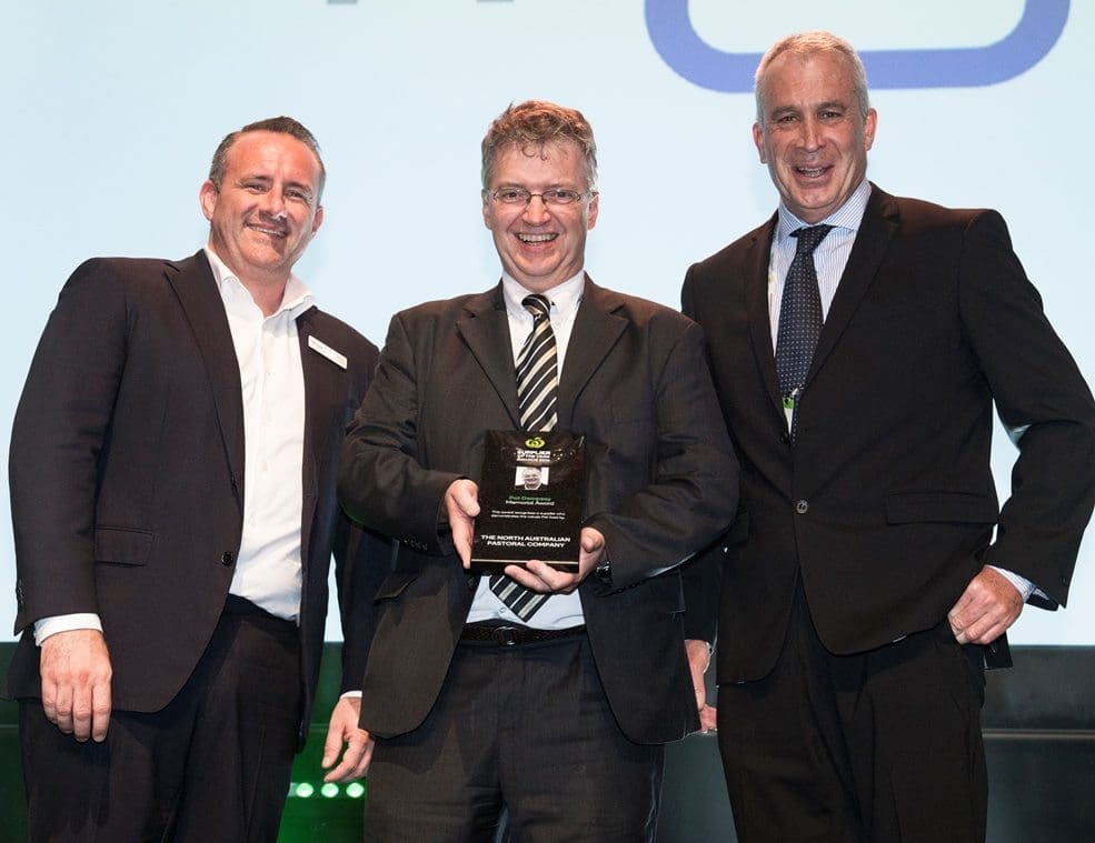 NAPCo's Geoff Kingston accepts the 2016 livestock supplier of the year award from Woolworths' Steve Donohue and Brett Thompson