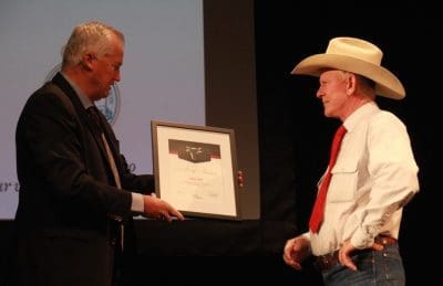 AWA presdient Peter Gilmour presents the Hall of Fame award to Wally Rea earlier today.