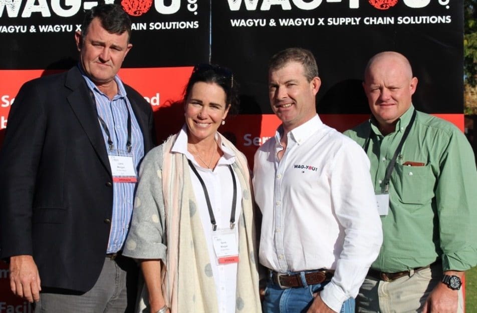 Vendors of the all-breeds record priced $95,000 in-utero Wagyu heifer Laird and Sonia Morgan, left, with agents Jeremy Cooper of Wag-You dot com and John Settree of Landmark. Absentee buyer was South African Hendrick Markram, who also bought the record priced semen package.
